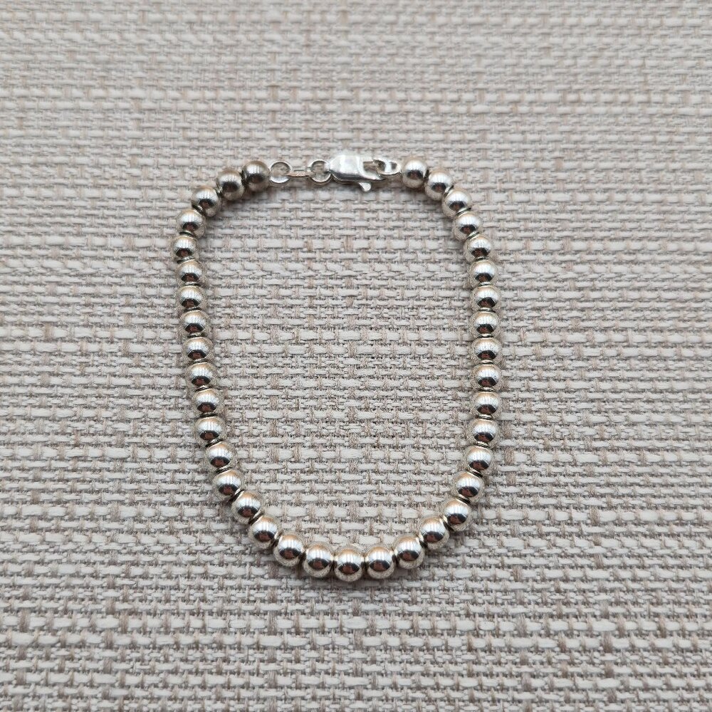 7 Inch Sterling Silver Bright Orbs Unisex Bracelet A5830